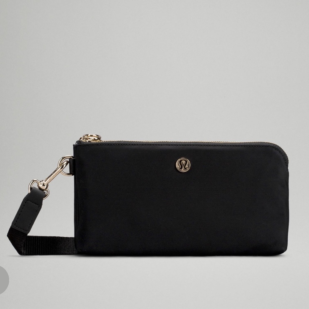 NWOT Lululemon Curved Wristlet in Black with Gold Hardware